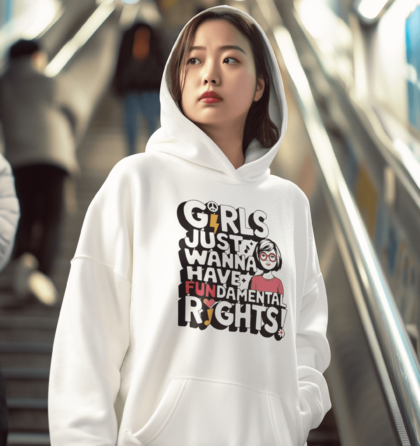 woman wearing a stylish hoodie that reads, Girls just wanna have FUNdamental rights